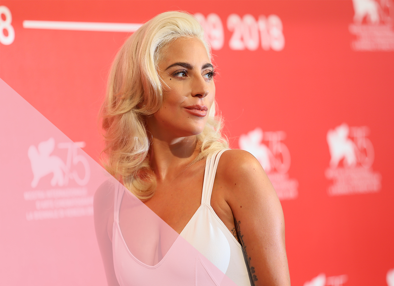 Lady Gaga photograph with blonde hair orange background