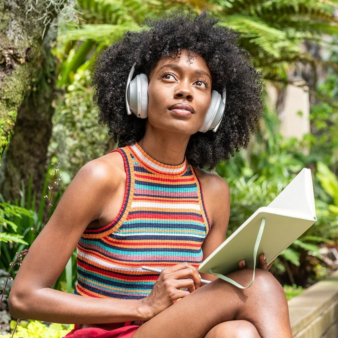 motivated woman wearing headphones